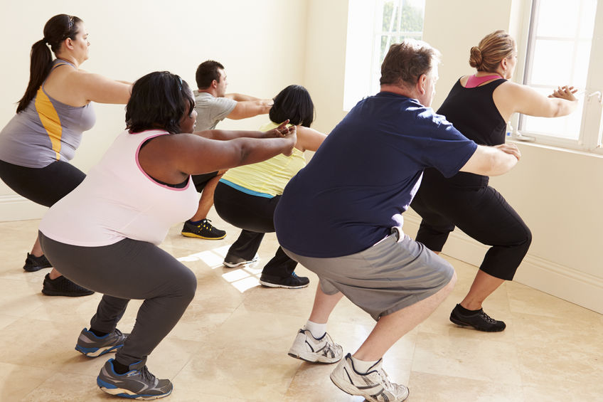 33545679 - fitness instructor in exercise class for overweight people