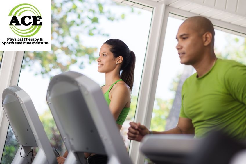 14356474 - man and woman working out and running on treadmill in fitness club