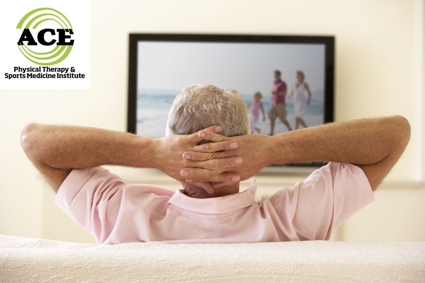 42397721 - senior man watching widescreen tv at home